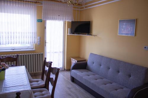 A television and/or entertainment centre at Sándor Apartman