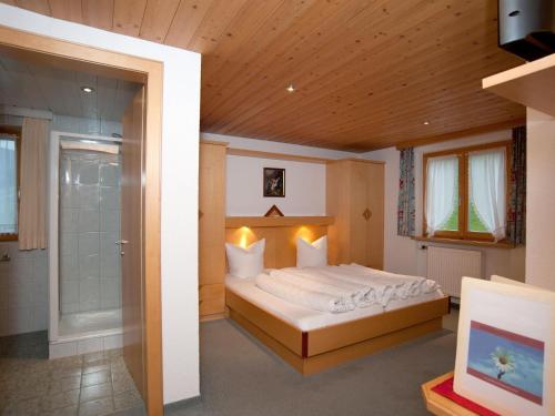 Krevet ili kreveti u jedinici u objektu Comfortable Apartment in Damüls with Swimming Pool
