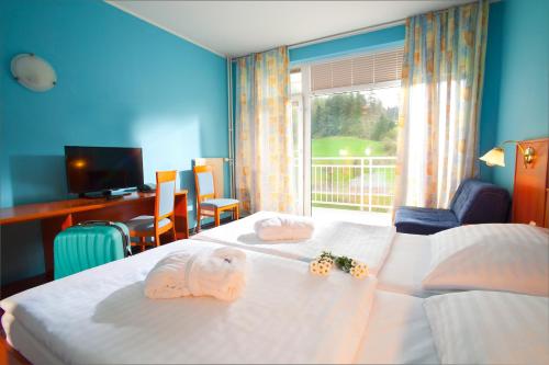 Postel nebo postele na pokoji v ubytování Terme Topolsica - Hotel Vesna