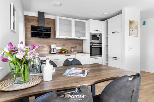 Köök või kööginurk majutusasutuses Ferienwohnung Winningmay II Füsing