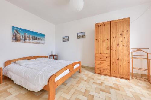 Postel nebo postele na pokoji v ubytování Vacances en famille - Jardin - 800m de la plage