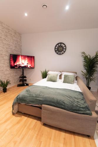 Ένα ή περισσότερα κρεβάτια σε δωμάτιο στο Magnifique duplex à Paris