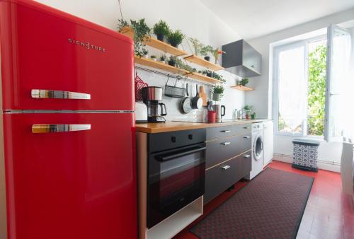Η κουζίνα ή μικρή κουζίνα στο Appartement 2 pièces Paris