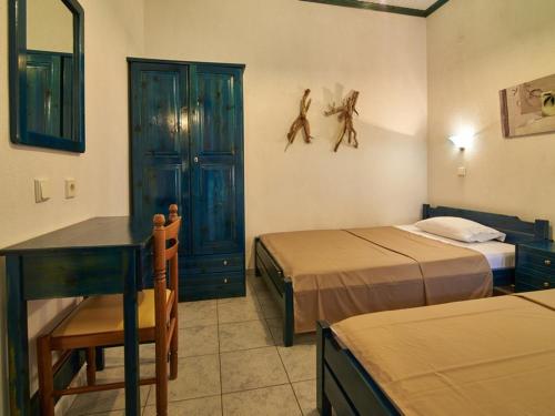 Ein Bett oder Betten in einem Zimmer der Unterkunft Toroni Dreams