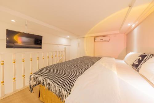 Postel nebo postele na pokoji v ubytování Lavender Apartment Branch