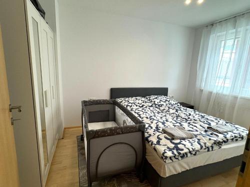 Cama o camas de una habitación en Gemütliches Apartment mit Garten: Tägliche Vermietung in Telfs