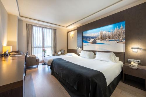 Postel nebo postele na pokoji v ubytování Hotel Nelva