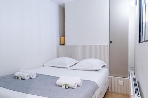 Llit o llits en una habitació de Lavie Maison A C & Sauna