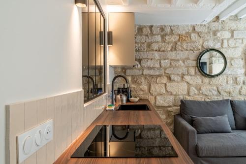 Zona d'estar a Lavie Maison A C & Sauna