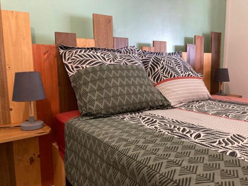 Ένα ή περισσότερα κρεβάτια σε δωμάτιο στο Ti Zeinga la