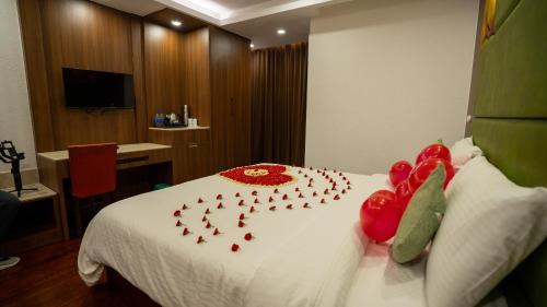 Ein Bett oder Betten in einem Zimmer der Unterkunft HillView Munnar