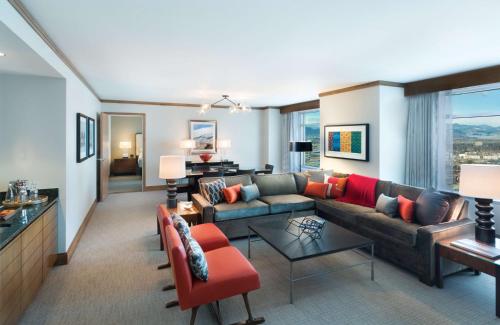 a living room with a couch and a table at Hyatt Regency Denver at Colorado Convention Center in Denver