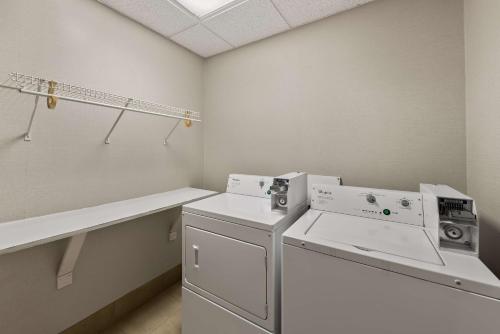 a laundry room with a washer and dryer at Hampton Inn Lancaster in Lancaster
