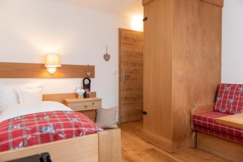 Postel nebo postele na pokoji v ubytování Gästehaus Sonnenplatzerl