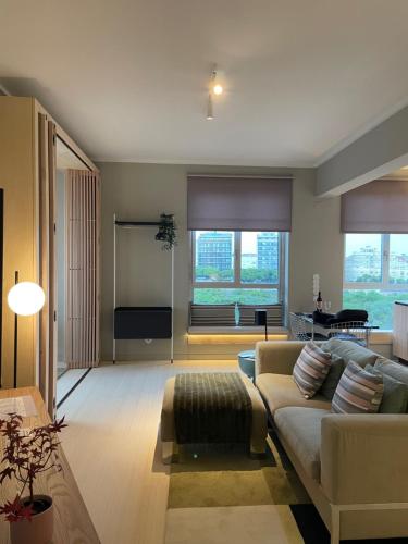 a living room with a couch and a table at BestHomeStay-Lisbon (Campolide) in Lisbon