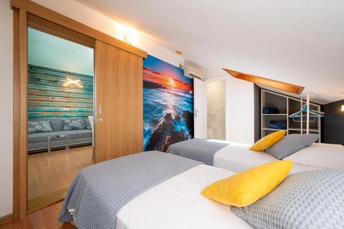 Postel nebo postele na pokoji v ubytování Villa Jidro
