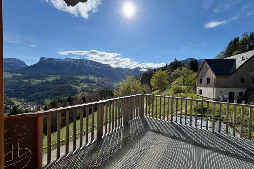 a balcony with a view of the mountains at Le balcon des Entremonts in Saint-Pierre-dʼEntremont