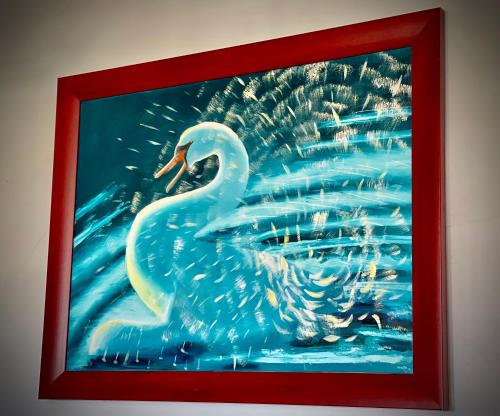 a framed picture of a swan in the water at Apartamento T1 Ruby in Vila Nova de Milfontes