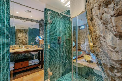 Koupelna v ubytování Capo la Gala Hotel&Wellness
