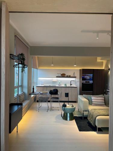 a living room with a couch and a table at BestHomeStay-Lisbon (Campolide) in Lisbon