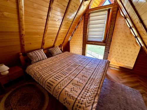 Postel nebo postele na pokoji v ubytování Vlasic Odmor - Villa Krajina V