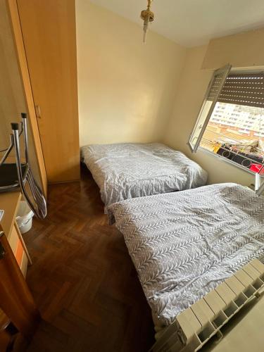 Säng eller sängar i ett rum på Habitación en bilbao