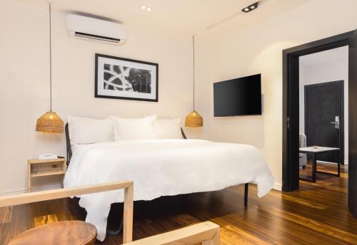 A bed or beds in a room at Ulo Lagos