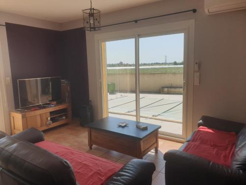 Posezení v ubytování Villa avec piscine en camargue