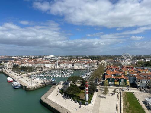a view of a harbor with boats in the water at L'amarrage éphémère in La Rochelle