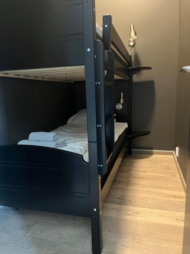 a bunk bed in a room with a bunk bedutenewayangering at Trysil Alpine Lodge in Trysil
