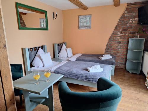 Posteľ alebo postele v izbe v ubytovaní Apartamenty i Pokoje Aneta