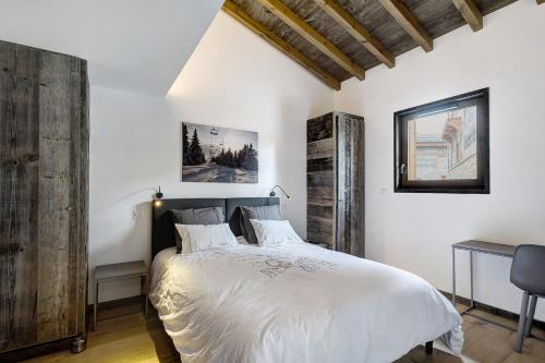 Ένα ή περισσότερα κρεβάτια σε δωμάτιο στο Chalet nid des écureuils