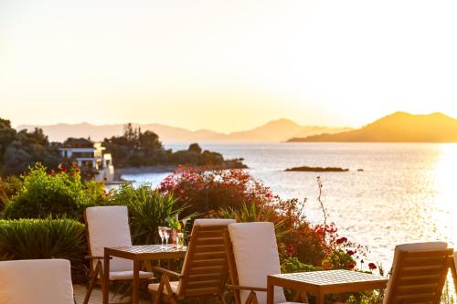 a table and chairs with a view of the water at Sofia Ada in Fethiye