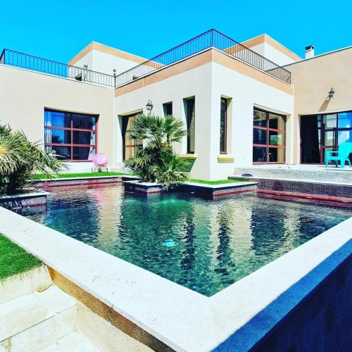 Magnifique villa atypique de 230 m2 avec patio intérieur