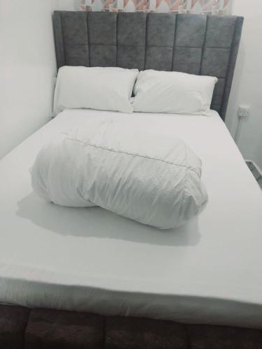 מיטה או מיטות בחדר ב-Lifestyle building