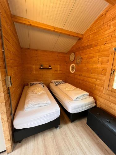 Postel nebo postele na pokoji v ubytování Herberg de Bos