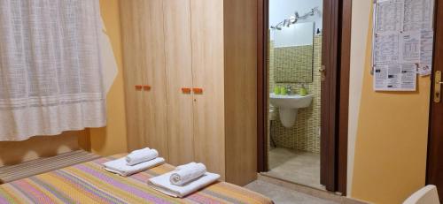 Postel nebo postele na pokoji v ubytování B&B Casa Mia