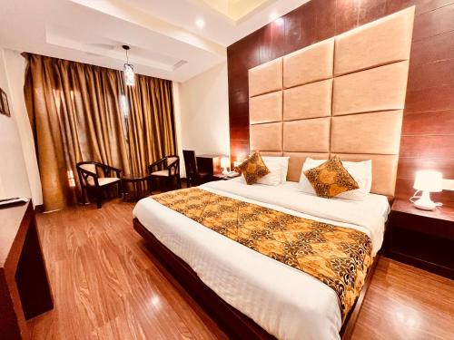Кровать или кровати в номере Intial Wood Resort