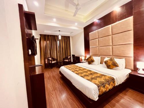 Кровать или кровати в номере Intial Wood Resort