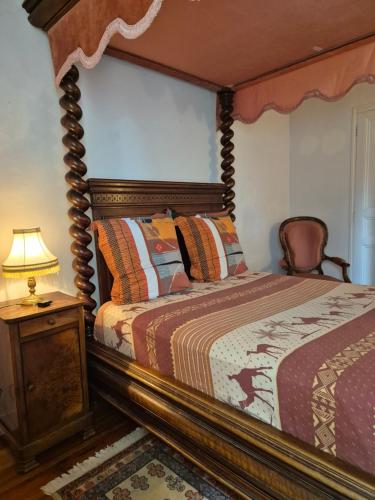 Ein Bett oder Betten in einem Zimmer der Unterkunft Mas de la vigne