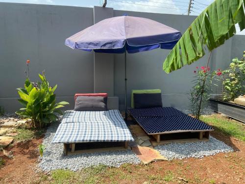 Jardín al aire libre en Bruks Guest House
