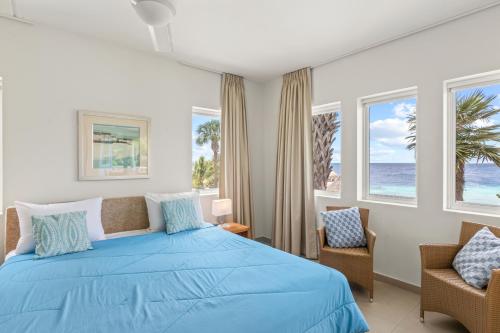 Postel nebo postele na pokoji v ubytování Blue Bay Beach Apartments