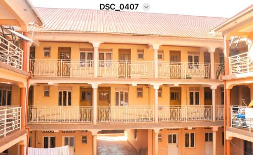 a view of a building with balconies at Kabale town flat (sitting and bedroom) in Kabale
