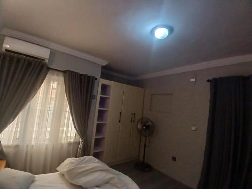 Llit o llits en una habitació de D little luxuries Apartment