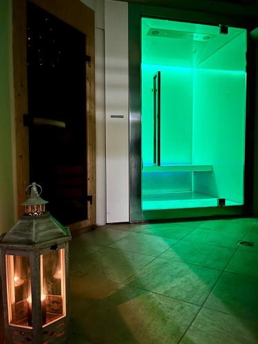 an open door with a lantern in front of it at Hotel Regina in Alassio