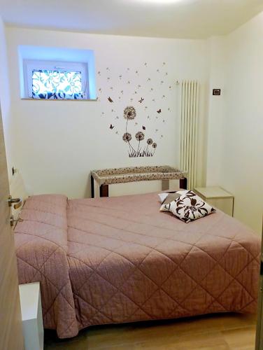 Ένα ή περισσότερα κρεβάτια σε δωμάτιο στο pesa apartment B&B