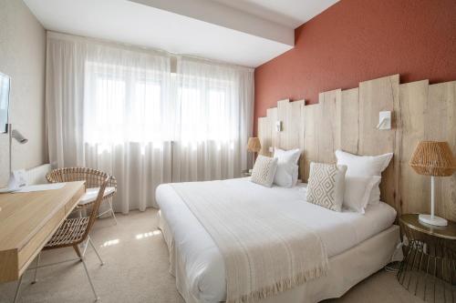 Postel nebo postele na pokoji v ubytování Hôtel BO & MIA
