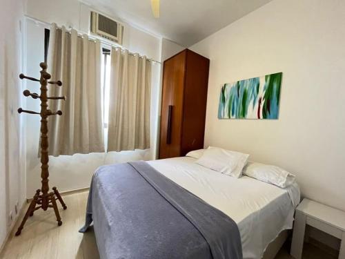 Кровать или кровати в номере MS145. Excelente apartamento em andar alto no Arpoador!