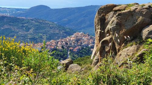 a view of a city from a mountain at Borgo Maria Rosa in San Salvatore di Fitalia