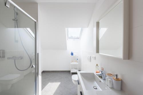 Koupelna v ubytování Libero Apartments